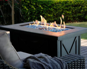 Propane fire pit table on a cozy patio