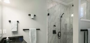 Simple luxury bathroom with granite and marble in residential home or hotel.