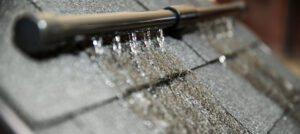 LeafFilter gutter guard during heavy rain and debris test.