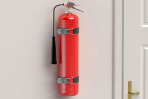 A fire extinguisher hanging on a wall.