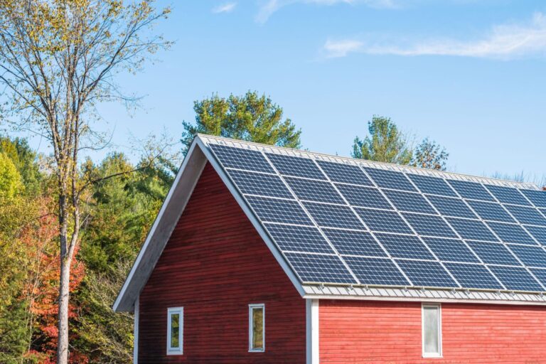 solar panels ontop of a barn