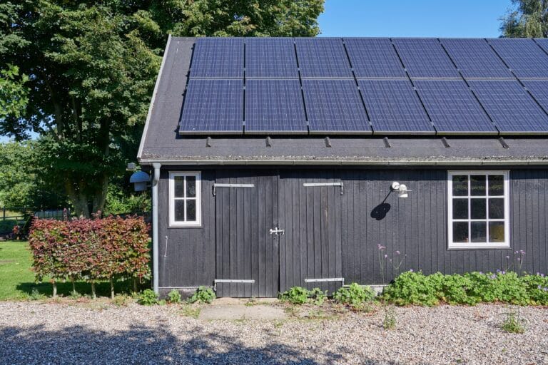 Barn with solar panels on top of it