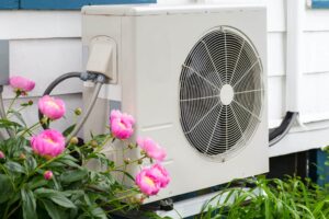 Heat pump on the side of a house